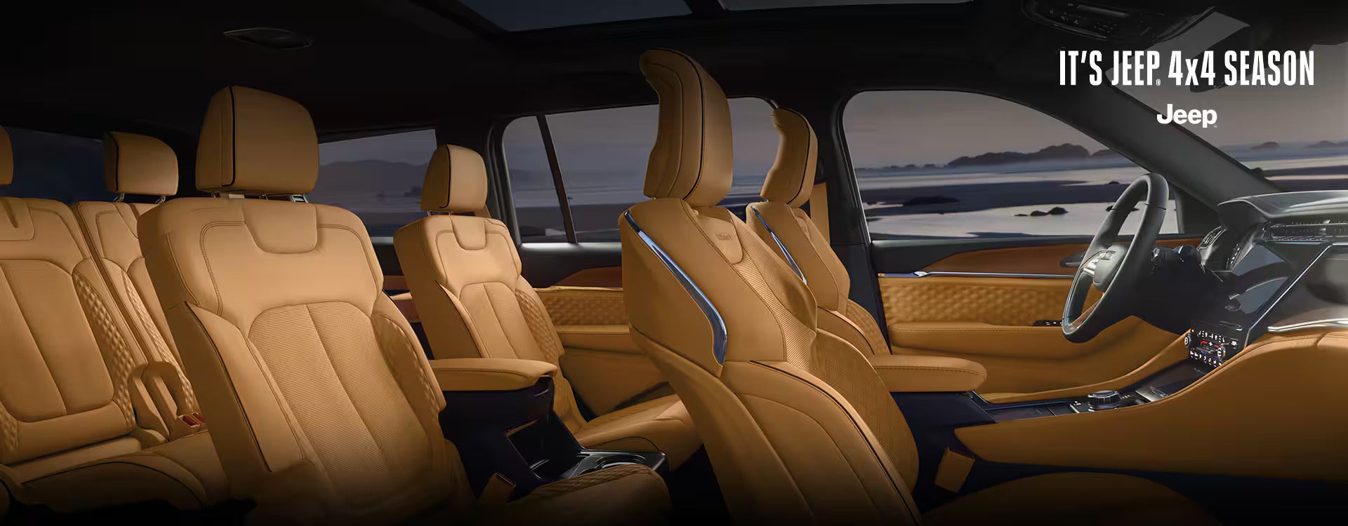 the beige leather interior of an suv with 3rd row seating